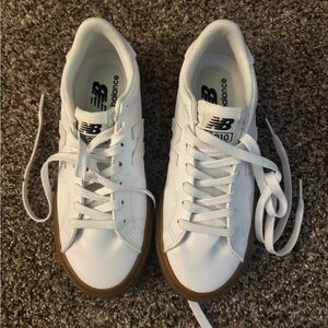 New Balance White Sneakers with Brown Sole